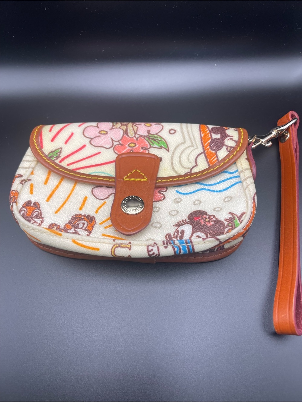 Dooney &  Bourke Disney Aulani wristlet/Wallet